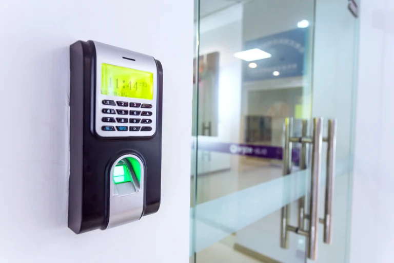 Biometric access control system with keypad and fingerprint scanner installed in Rockledge FL office