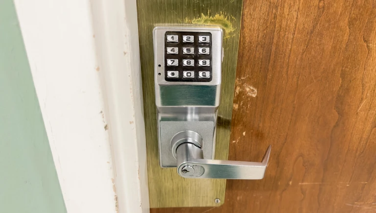 Commercial keypad door lock repaired by locksmith in West Melbourne FL office building