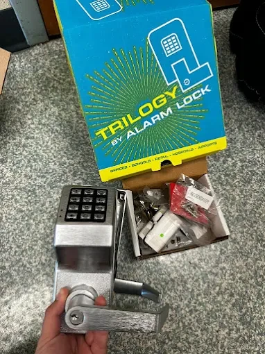 Commercial keypad door lock installation for keyless entry system in Melbourne FL business property