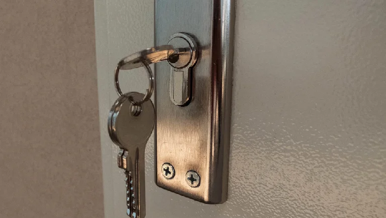 Commercial door lock rekey service with new keys in Port St John FL office