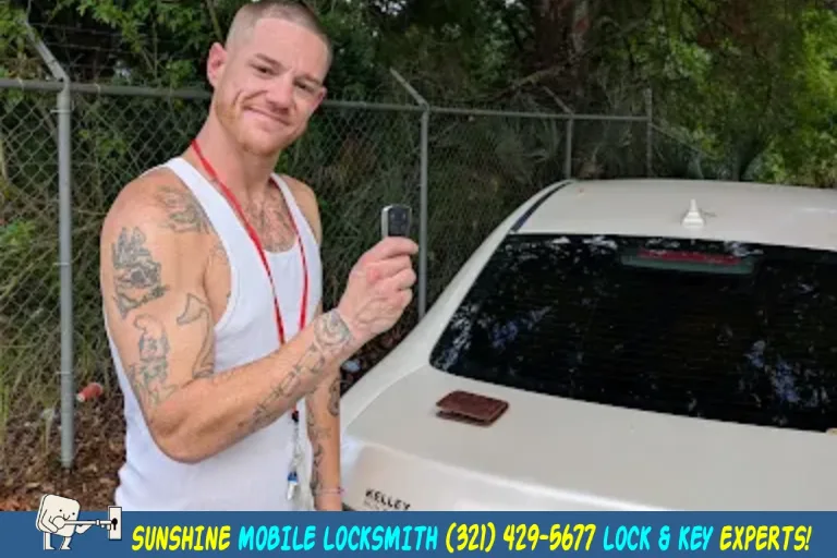 Happy driver in Cocoa Beach FL showing new Buick car key provided by Sunshine Mobile Locksmith after fast on-site service.