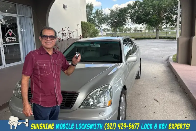 Smiling customer in Viera FL after receiving new car key from Sunshine Mobile Locksmith, offering reliable and affordable automotive locksmith services.